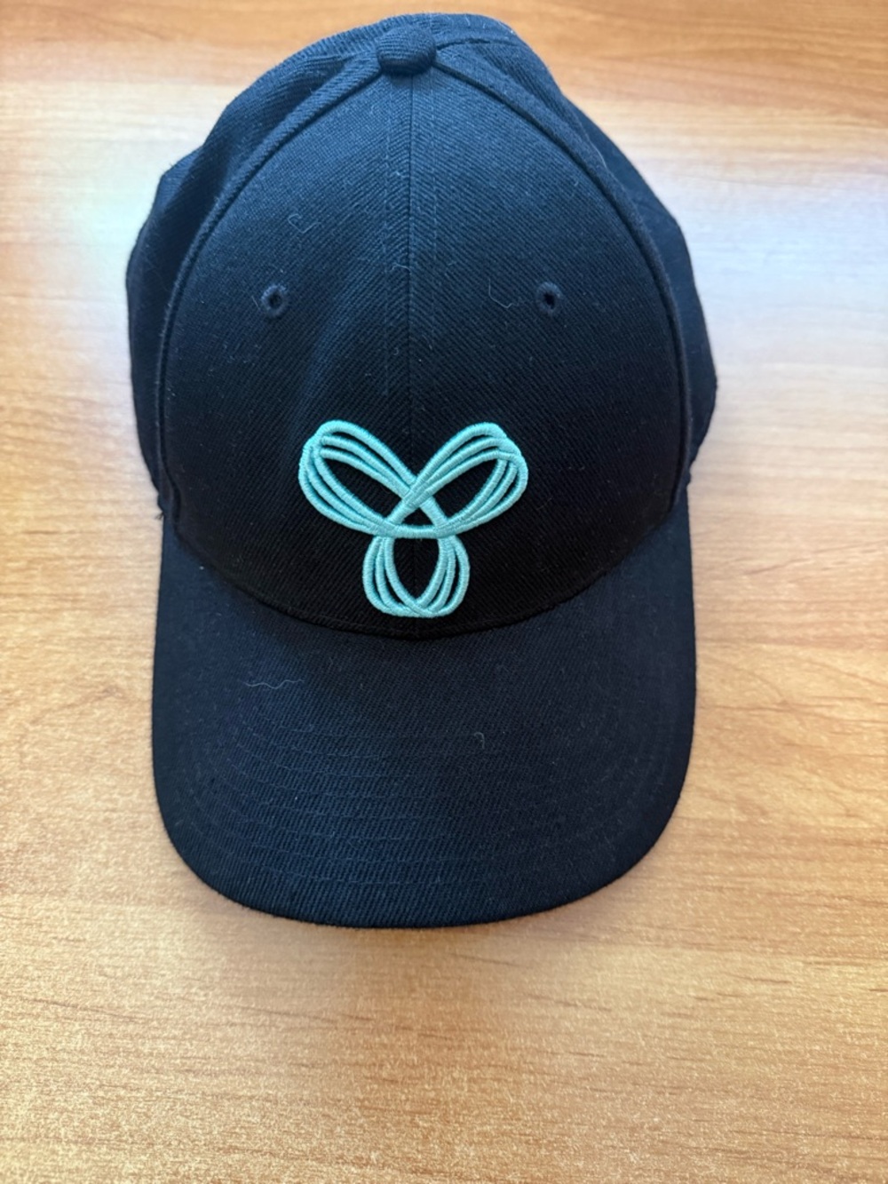 TNA Black Baseball Cap with Teal Embroidered Logo